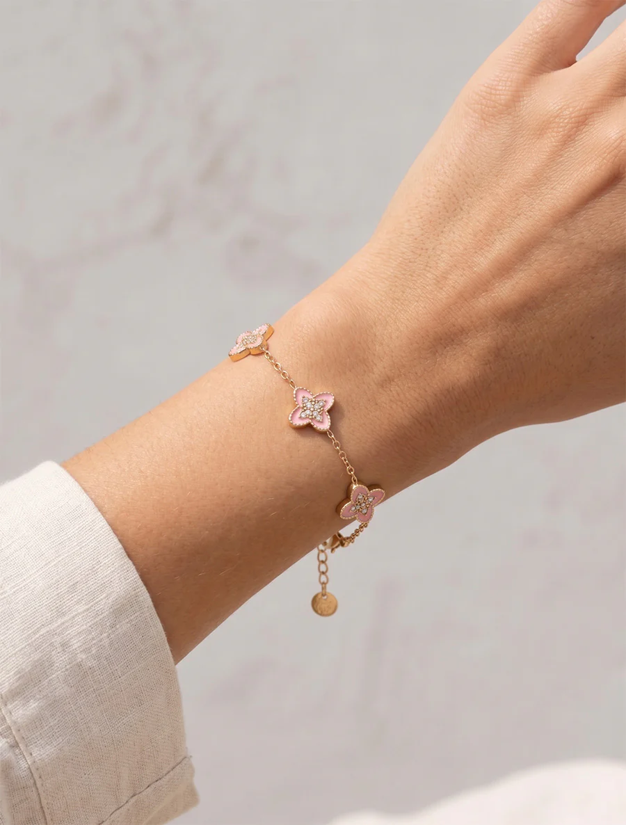 Armband met klavers versierd met witte zirkonia's - Goud/roze