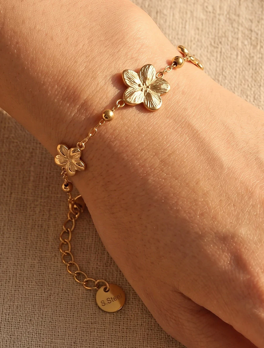 Drie-bloemen armband - Goud