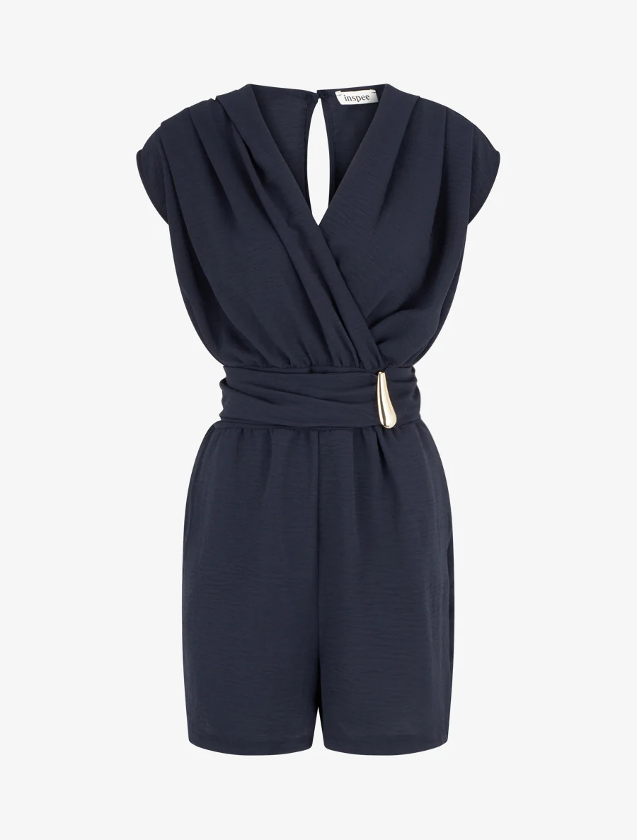 Effen jumpsuit met sierstuk in de taille. - Marine