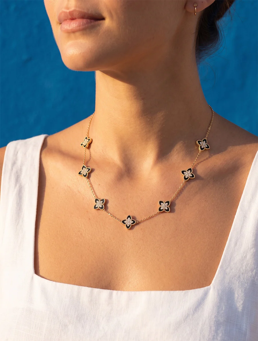 Ketting met klavers versierd met witte zirkonen - Goud/zwart