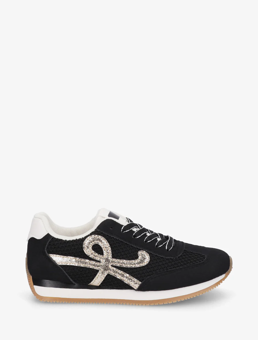 Platte sneakers met inzetstukken van canvas. - Zwart