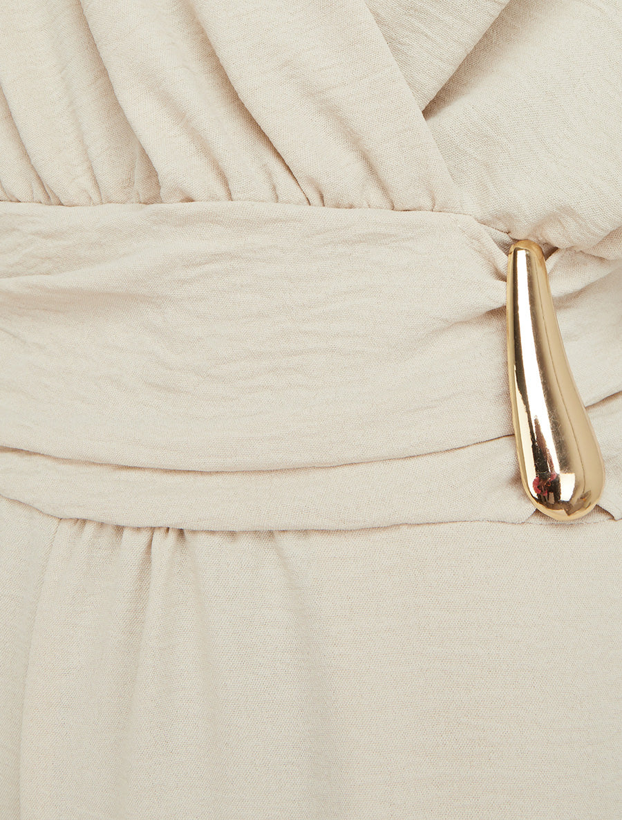 Ruime jumpsuit met wikkeloverslag en draperend effect - Beige - Image 3