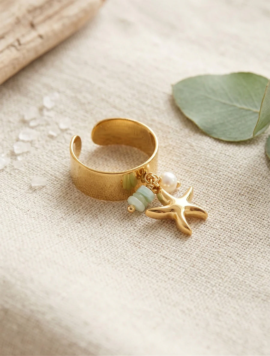 Verstelbare ring met zeester bedel - Goud